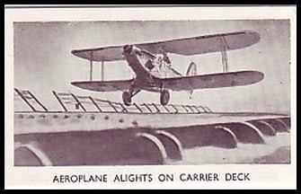 Aeroplane Alights on Carrier Deck